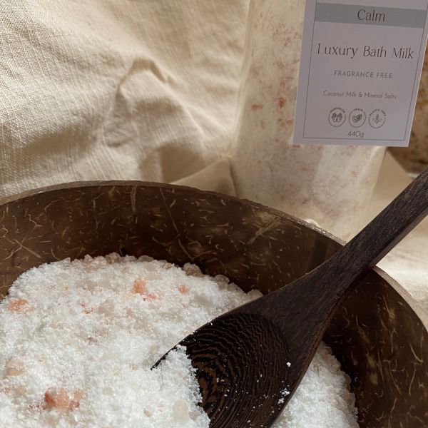 Pink and white Bath Milk in Coconut Bowl  with Spoon